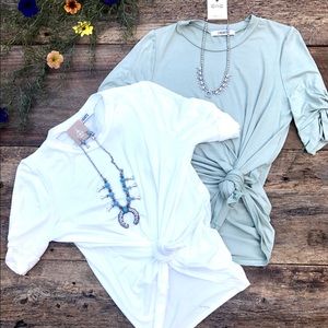 Sage and white blouses